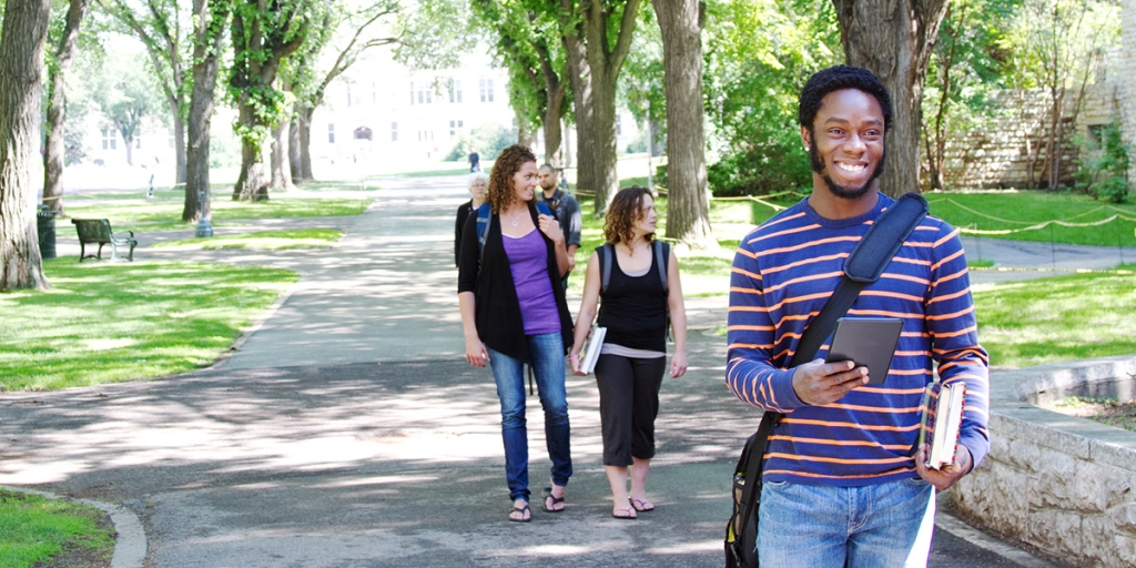 Students exploring college campus in the summer