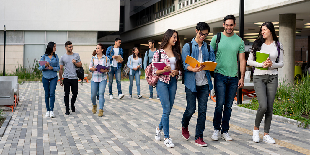 Students walk together on campus