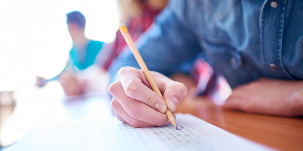 Students filling out answers to a multiple-choice test