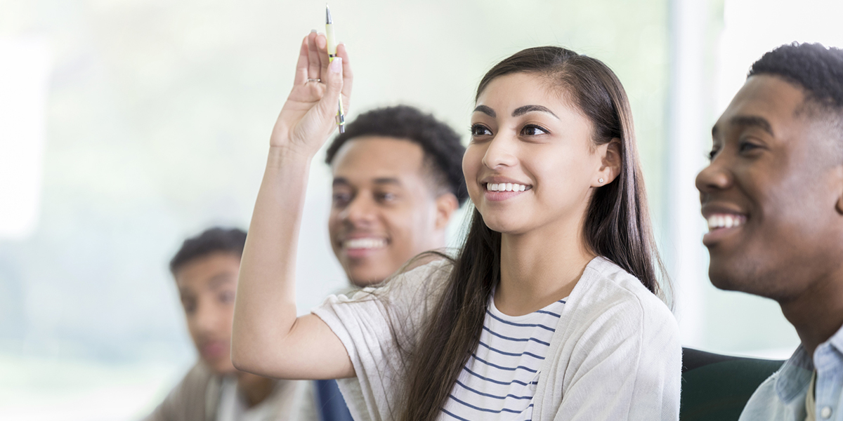 Student volunteering an answer in class