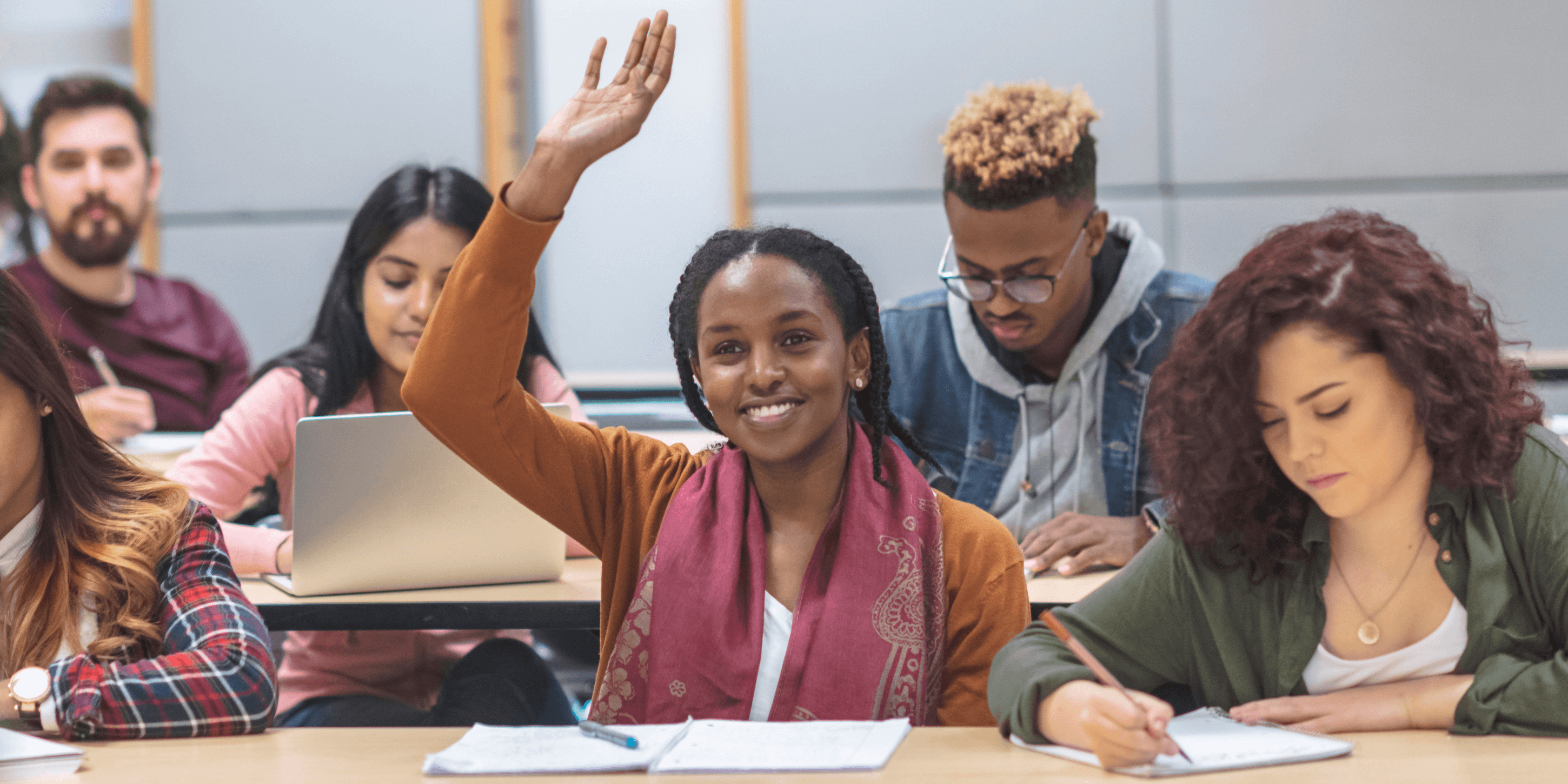 Group of diverse students in class.