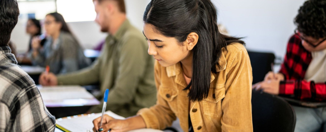Young woman studying in the classroom at university